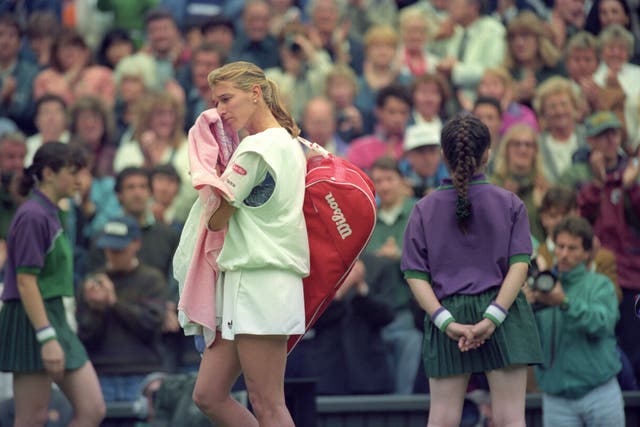 Defending champion Steffi Graf leaves Centre Court at Wimbledon after losing to Lori McNeil 