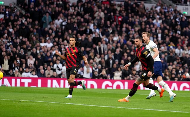 Harry Kane scores for Tottenham against Manchester City (John Walton/PA).