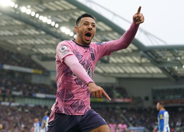 Dwight McNeil celebrates against Brighton