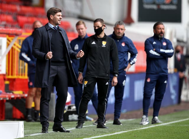 Rangers manager Steven Gerrard (left) saw his side kick off with a win 