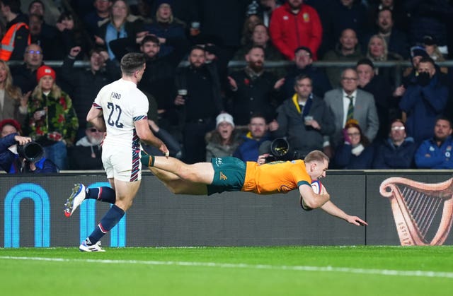 Max Jorgensen dives over the try line