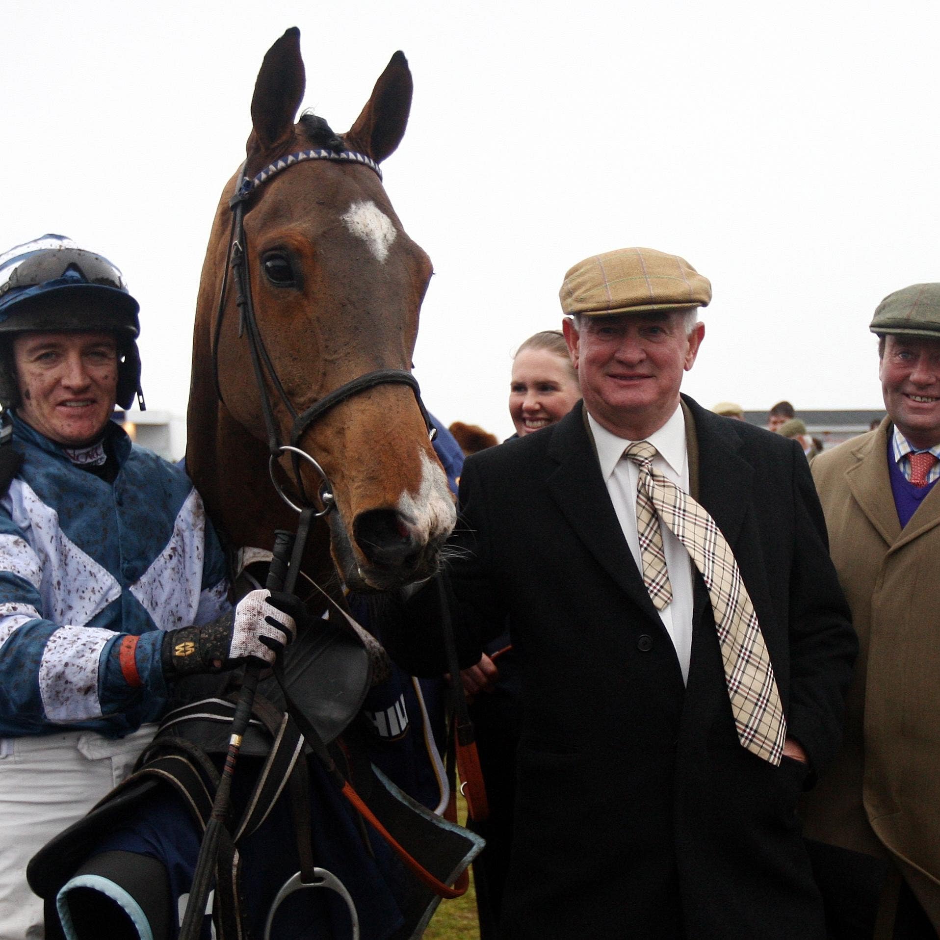 Dai Walters (second right) believes racing should resume