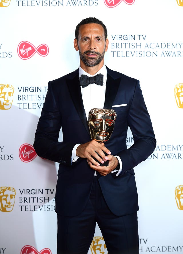 Rio Ferdinand with his award for Best Single Documentary (Ian West/PA)