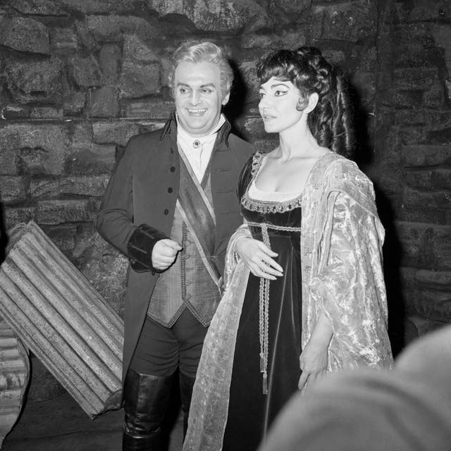 Opera stars Maria Callas and Tito Gobbi in a scene from Tosca, with Gobbi as Baron Scarpia and Callas as Floria Tosca, one of her greatest roles.
