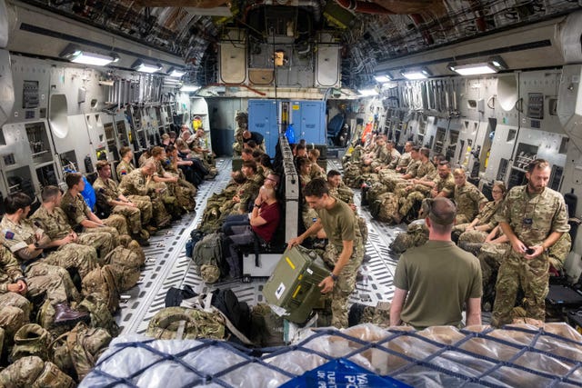 British troops on a flight to Afghanistanitting deployment to Afghanistan