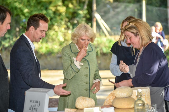 Camilla tasted the company's four speciality cheeses (Ben Birchall/PA)