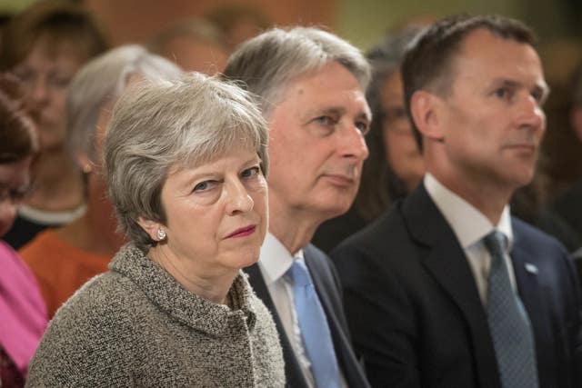 Prime Minister Theresa May, Chancellor Philip Hammond, and Health secretary Jeremy Hunt at the Royal Free Hospital (Stefan Rousseau/PA)