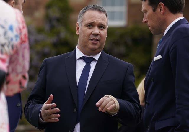 Detective Chief Superintendent John Caldwell at a garden party at Hillsborough Castle 