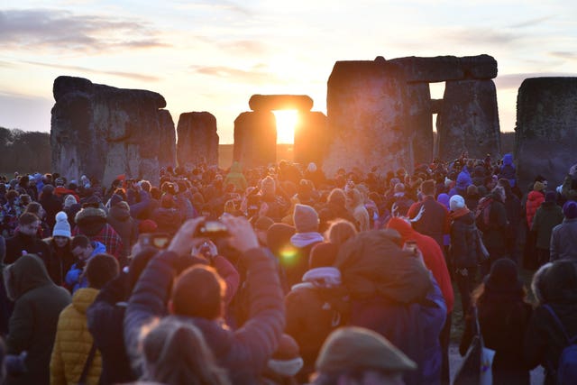 People gathered at Stonehenge