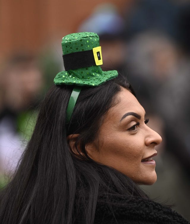 A woman in a green hat in Belfast
