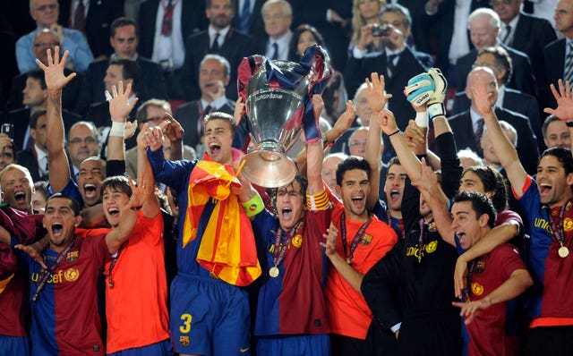 Carles Puyol, centre, won three Champions Leagues at Barcelona (Rebecca Naden/PA)