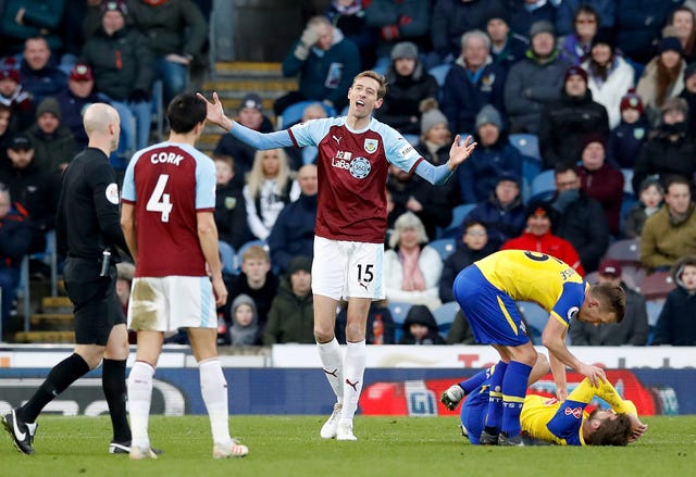 Burnley striker Peter Crouch appeals after being penalised for a foul