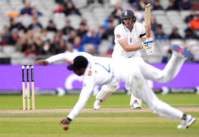 England’s Jamie Smith hits the ball past Sri Lanka’s Kamindu Mendis 