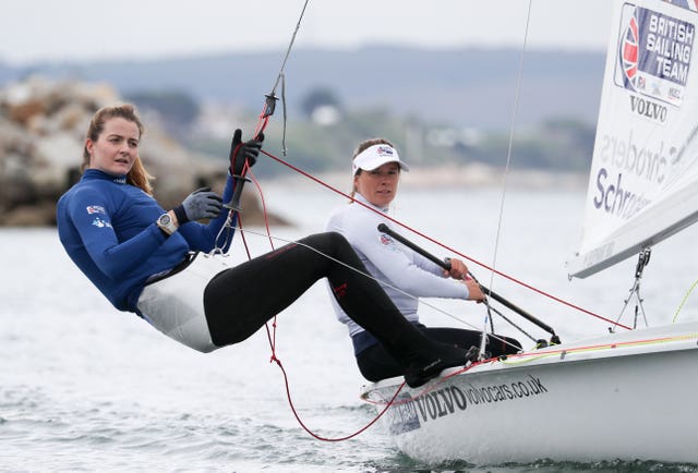 Great Britain's Eilidh McIntyre and Hannah Mills, right, have secured a medal in the 470 class