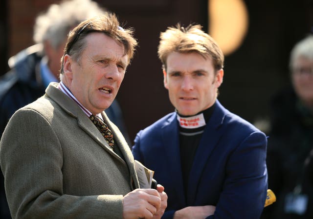 Peter Scudamore (left), Tom's father, was a former champion jockey