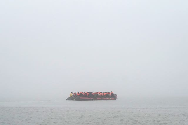 People thought to be migrants onboard a small boat in Gravelines, France, last month