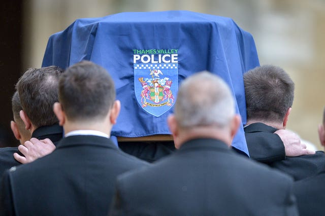 The police insignia on the coffin at the funeral of Pc Andrew Harper (Ben Birchall/PA)