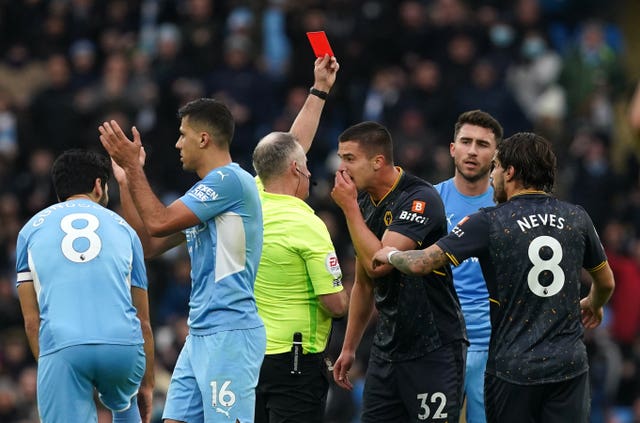 Raul Jimenez was sent off for blocking the taking of the free-kick he conceded