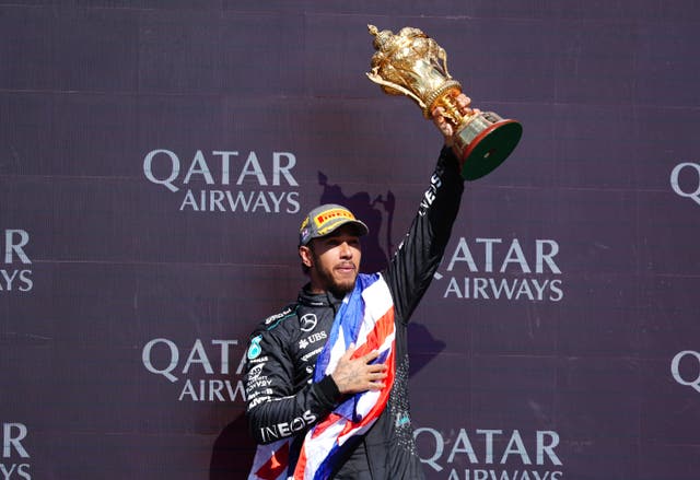 Lewis Hamilton celebrates winning at Silverstone