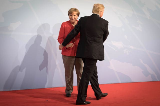 Angela Merkel and US President Donald Trump Stefan Rousseau/PA