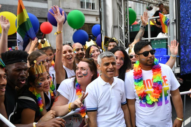 Mayor of London Sadiq Khan joins members of the crowd ahead of the Pride in London Parade