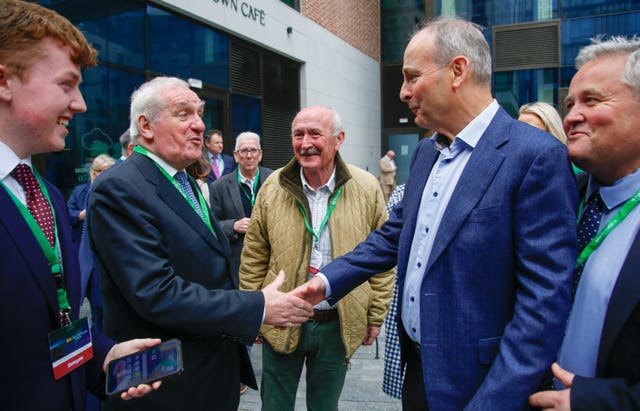 Bertie Ahern shakes hands with Micheal Martin