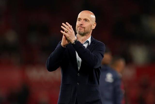Manchester United manager Erik ten Hag applauds the fans after beating Chelsea