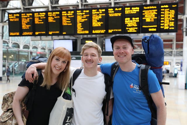 From left: Becky Moriarty, Jared Hill and Rory Leighton at Paddington Station in London, on their way to Glastonbury