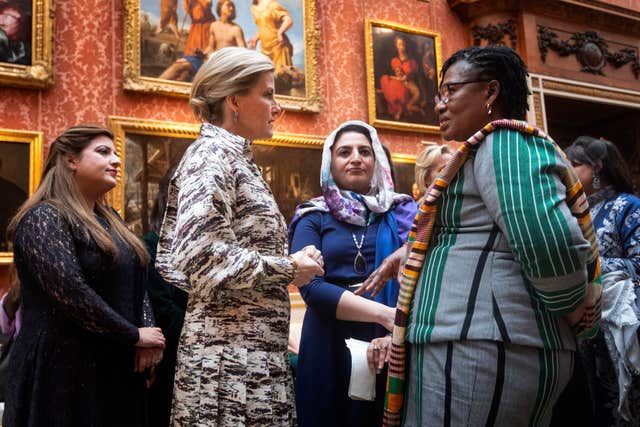 The Countess of Wessex talks with guests during a reception at Buckingham Palace