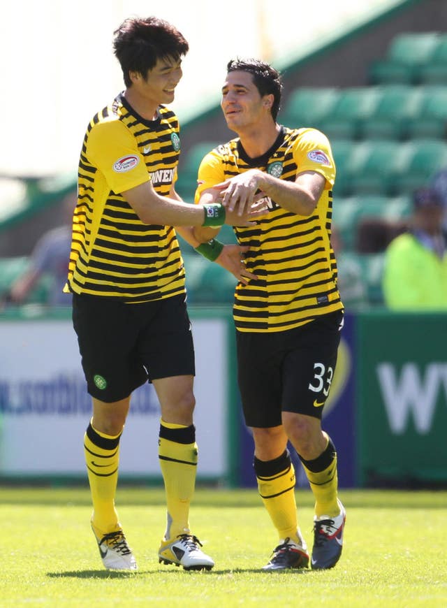 Ki is congratulated by Beram Kayal after netting the second