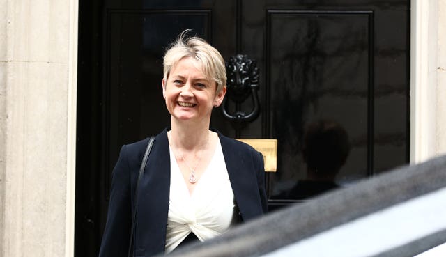 Home Secretary Yvette Cooper in front of the Downing Street door