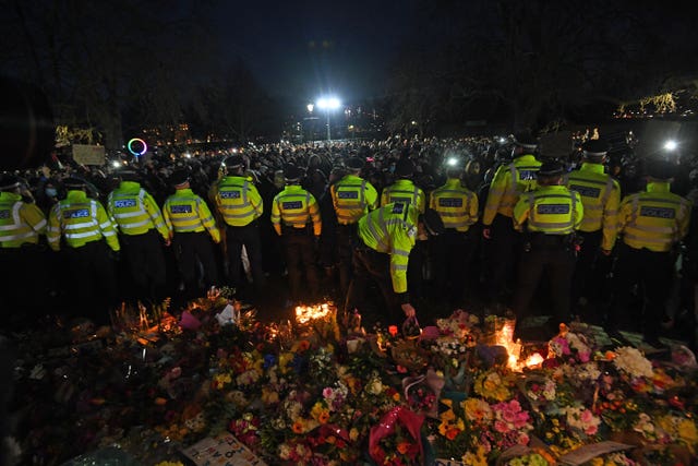 Police surround the band stand in Clapham Common, London, after the Reclaim These Streets vigil for Sarah Everard was officially cancelled 