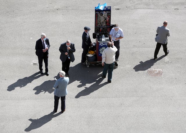 Racegoers place bets at Doncaster 