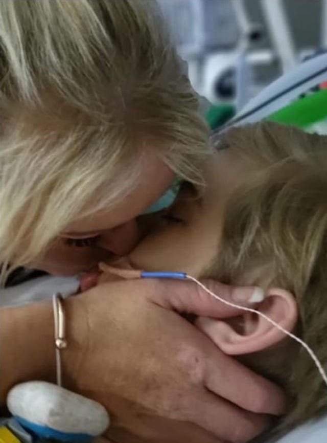 Hollie Dance with her son Archie in hospital