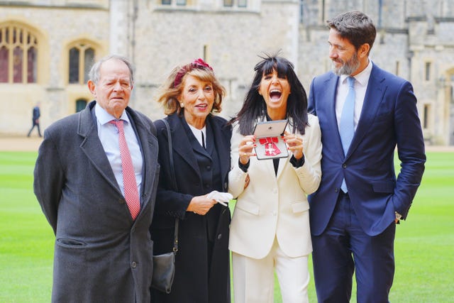 Winkleman with her parents Barry Winkleman, left, and Eve Pollard and her husband Kris Thykier at Windsor Castle 