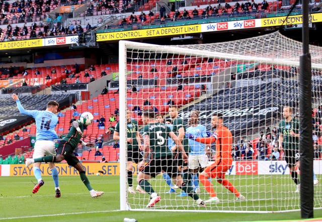 Aymeric Laporte, left, scores Manchester City's winner at Wembley on Sunday