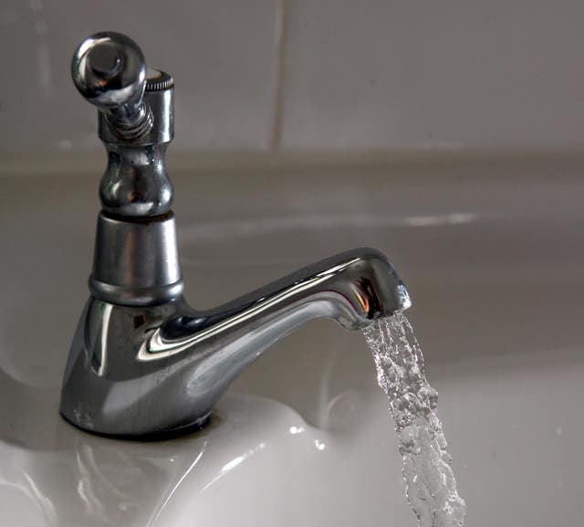 Water flowing from a tap