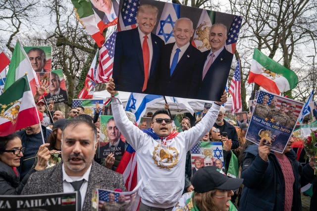 People take part in a rally held outside the US consulate in Edinburgh