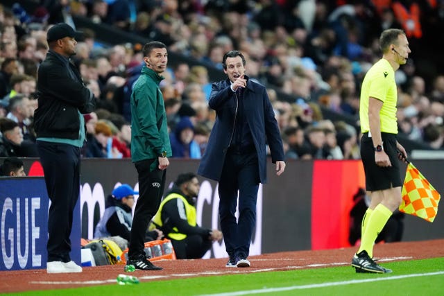 Aston Villa manager Unai Emery, centre right, gestures on the touchline during a Champions League match at Villa Park