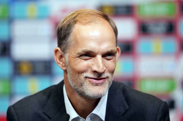 England head coach Thomas Tuchel smiles at a press conference