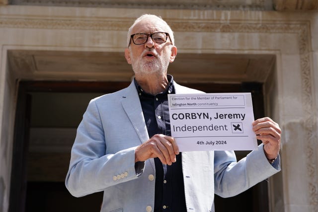 Former Labour Party leader Jeremy Corbyn poses outside Islington Town Hall, north London, after handing in his nomination papers for the General Election on July 4. 