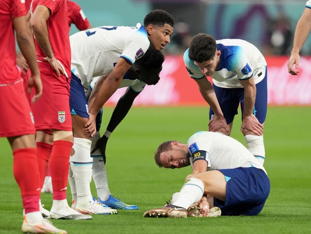 England’s Harry Kane holds his ankle 