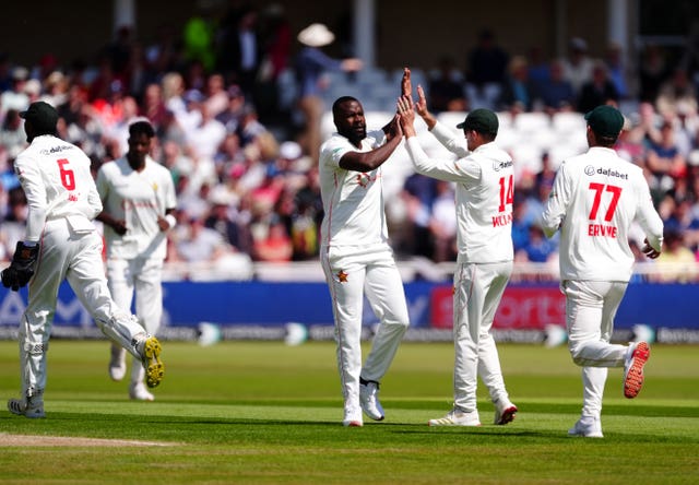 Zimbabwe’s Tanaka Chivanga celebrates the wicket of England’s Ollie Pope (not pictured) 