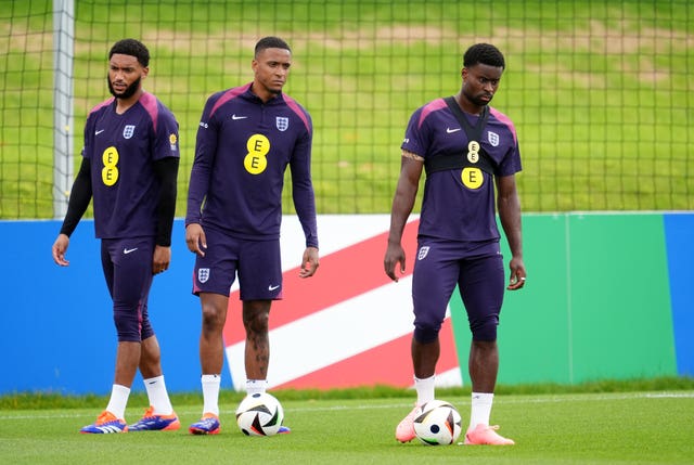 England’s Joe Gomez, Ezri Konsa and Marc Guehi, left to right, during a training session