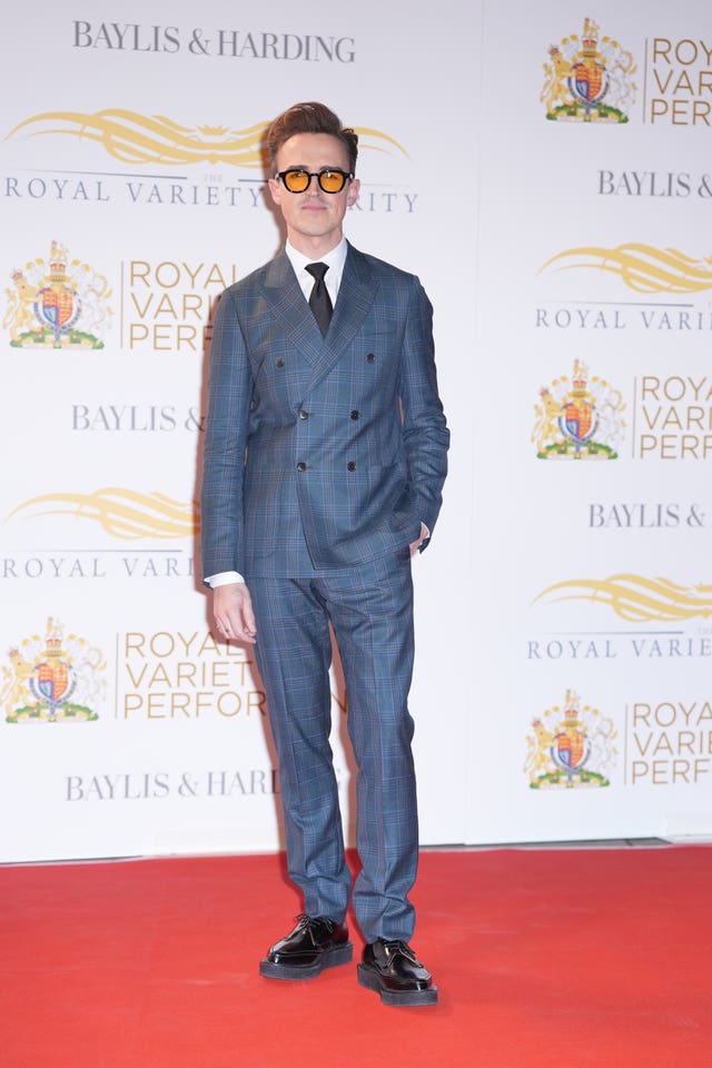 Tom Fletcher posing for photos on a red carpet
