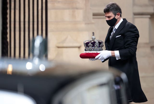 The Imperial State Crown is taken to the Palace of Westminster