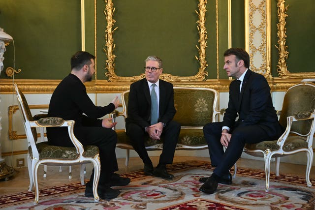 Ukraine’s president Volodymyr Zelensky, left, Prime Minister Sir Keir Starmer, centre, and France’s president Emmanuel Macron meet during a Leaders’ Summit on the situation in Ukraine at Lancaster House, London, on Sunday