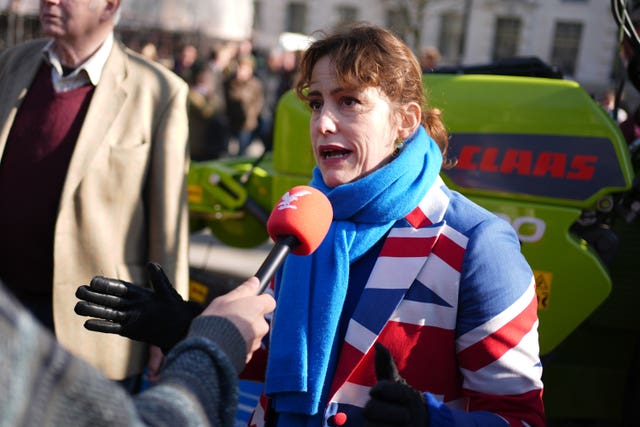 Victoria Atkins speaking at farmers' protest