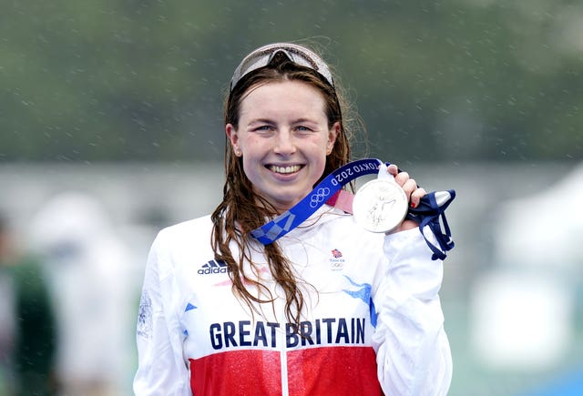 Georgia Taylor-Brown celebrates with her silver medal