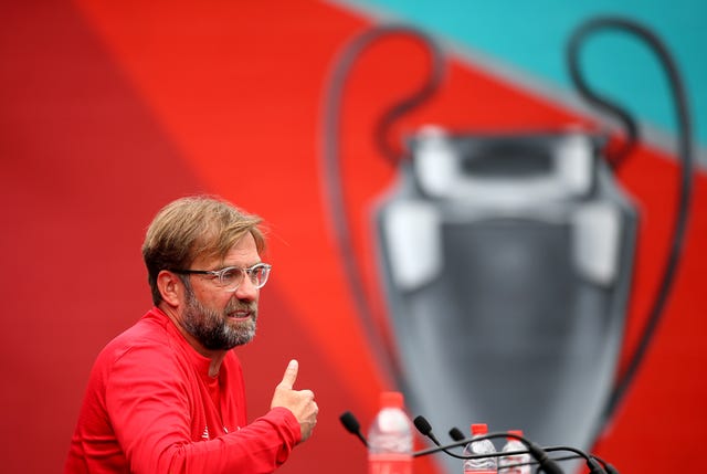 Liverpool manager Jurgen Klopp insists it is more important to focus on progress than trophies